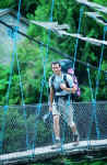 The author crossing one of the many hanging bridges the team encountered.  Renzo Uccelli