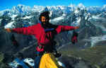 The Himalayas seen in all their majesty from an inhospitable summit 26,250 feet up.  Roberto Montovanni